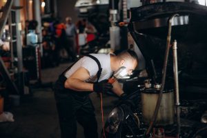 DPF is clogged, mechanic inspecting car
