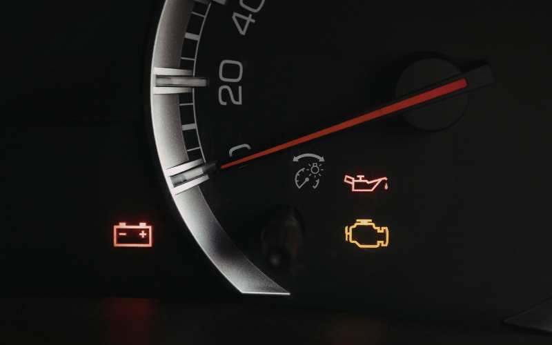 Car dashboard warning light indicating performance issue