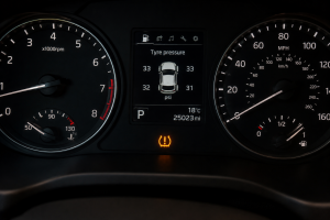 Tyre pressure warning light shown on a car instrument cluster