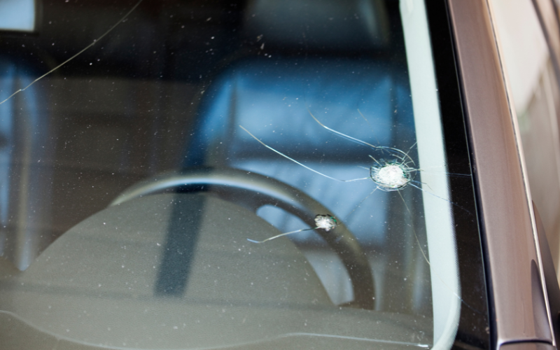 Damaged car windscreen that could lead to an MOT failure