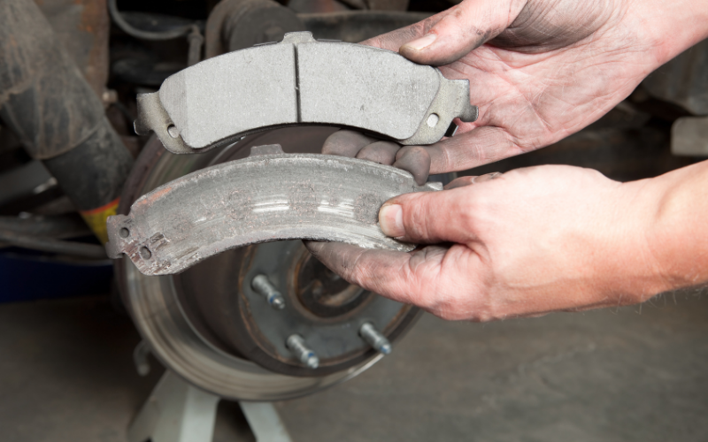 New brake pad compared with a severely worn brake pad
